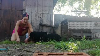 Mia Stone - Rottweiler gardening