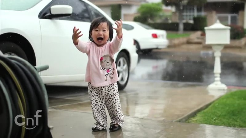 Little Girl Experiences Rain For The