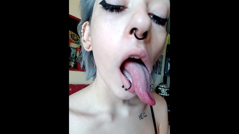 Sexy emo babe with long tongue & yawns