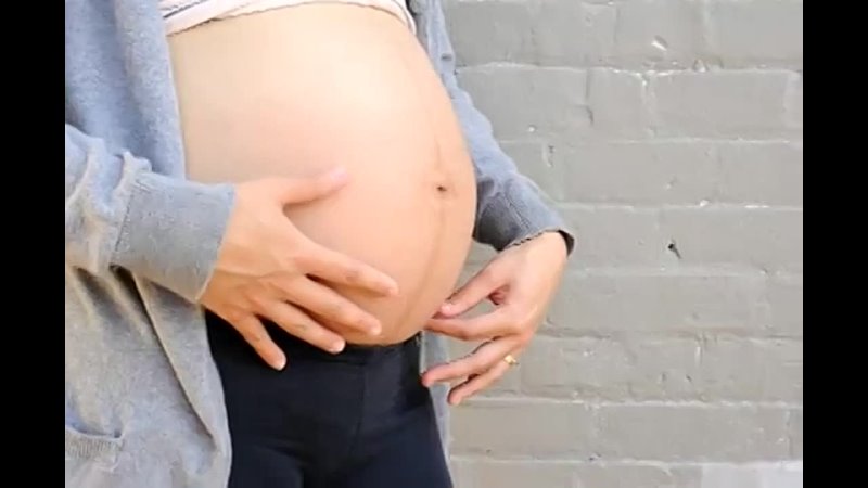 Cute Asian pregnant lady