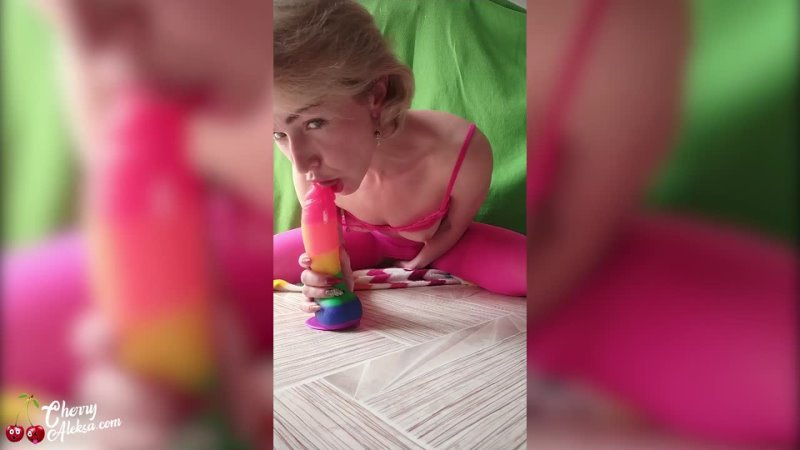 Woman Jumping on Rainbow Dildo and Playing with Butt Plug Cherry