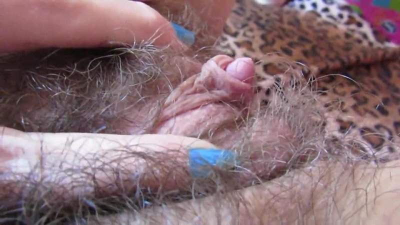 milf s hairy pussy with big clit teasing closeup.