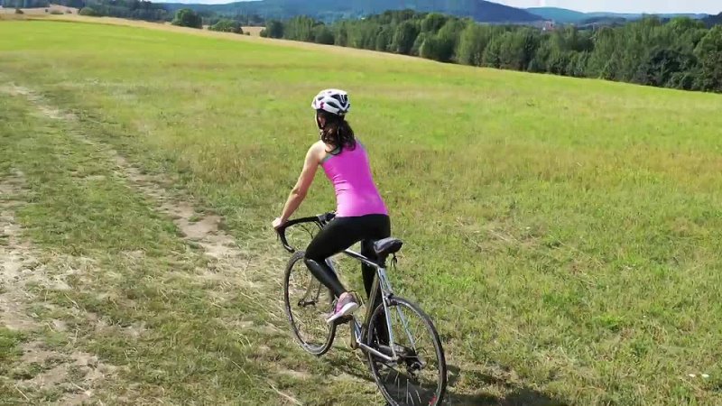 Girl rides bike in latex leggings Gc Tecn Jm5