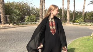 Walk in Arabic dress Abaya....