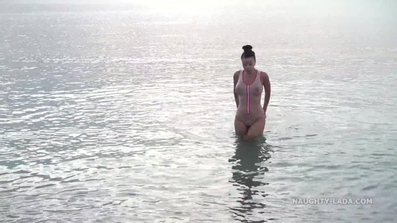 Wet transparent swimsuit in