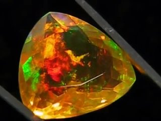 Ethiopian Welo yellow crystal faceted trillon cut amazing Opal !!! investment grade