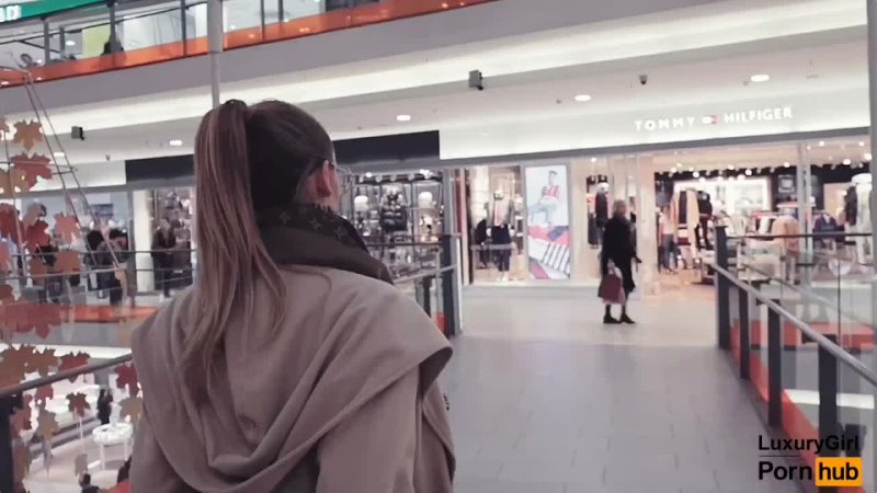 Public Blowjob In A Clothing Store. A Young Baby With Glasses Swallows Cum