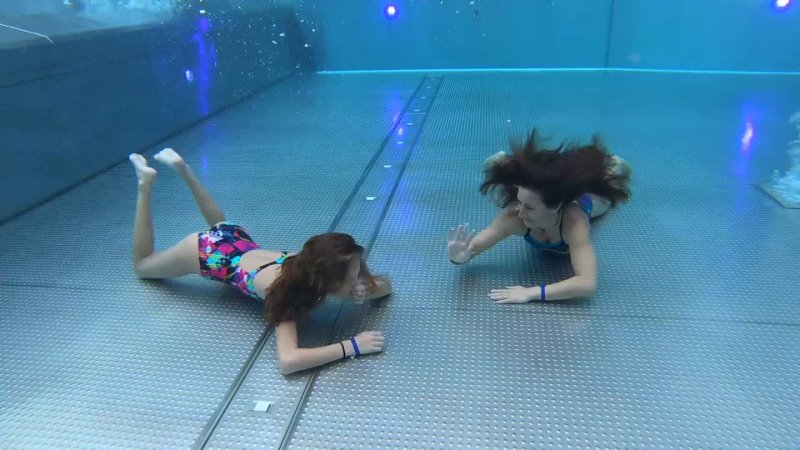 Carla Underwater swimming with my Mom with snow around