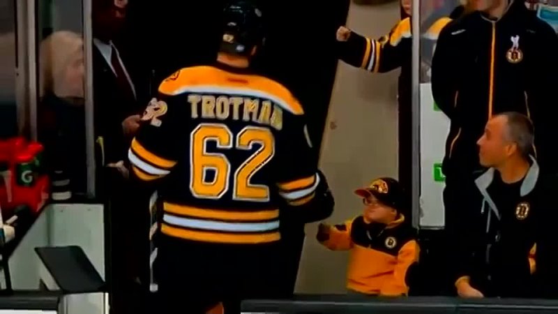 Young Fan Fist Bumps Boston Bruins after their Pregame Warm Up