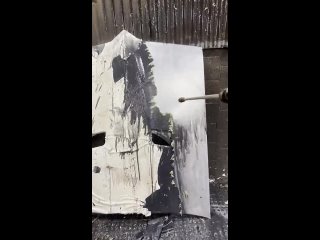 Pressure washing a firebird hood after a chemical dipping process