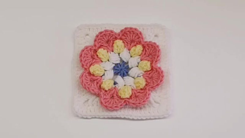 Crochet granny square pattern for flower themed baby girl blanket Crochet