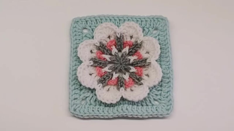 Crochet granny square with 3 D flower Motif,