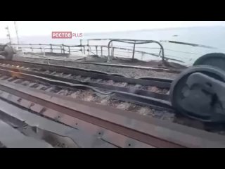 Последствия пожара на железнодорожной части Крымского моста.