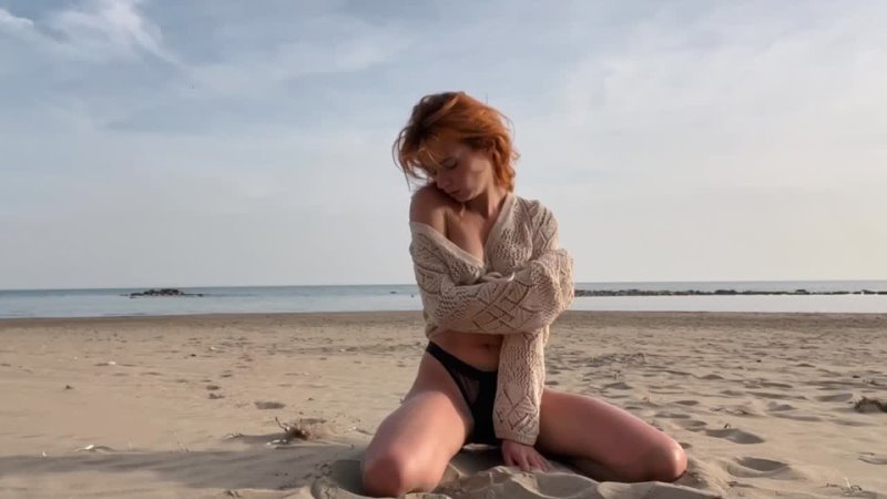 Sexy Girl having Fun on Sandy Beach