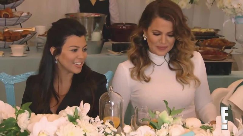 Khloe Kardashian and Kim Kardashian arriving at Kourtney's baby shower