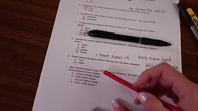   Teacher Helps You with Grammar Test (over the shoulder 