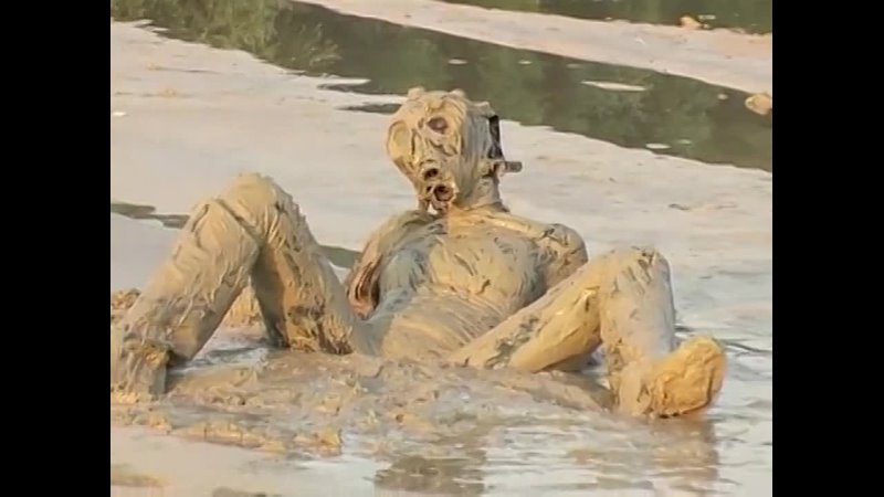 Latex girl in mud