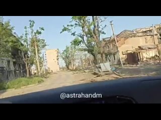 Архивное видео бойцов ЧВК Вагнер проезда по освобожденным частям города незадолго до полного освобождения Бахмута.