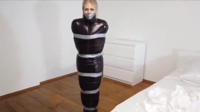 Hot blonde bound and tape gagged wrapped 1