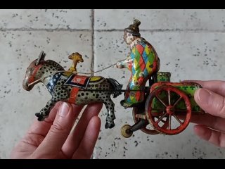 Чудесная механическая советская игрушка “Цирковой выезд“, выполненная из металла.