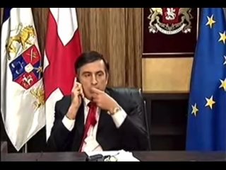 Испуганный грузинский диктатор жуёт галстук