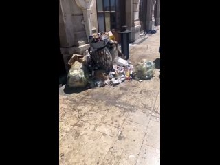 Overflowing trash cans at the Saint-Charles train station in Marseille