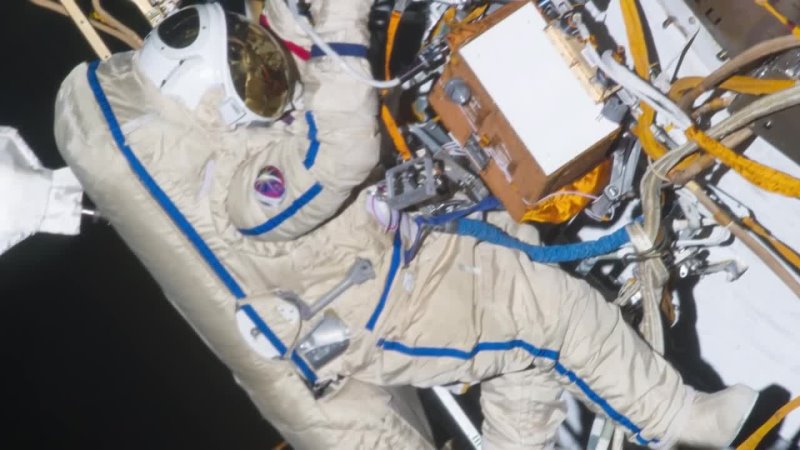 Spacewalking Cosmonaut Tosses Satellite