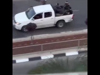 Бойовики Хамаса расстреливают полицейскую машину Израиля