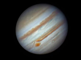 Таймлапс вращения Юпитера в течение одного часа, заснятый астрономом-любителем Эндрю МакКарти.