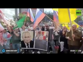 Палестинцы вышли на демонстрацию против действий ЦАХАЛ с российскими флагами и портретами Путина и Ким Чен Ына