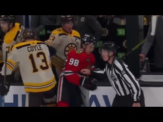 Brad Marchand pushes Bedard to the Boston bench
