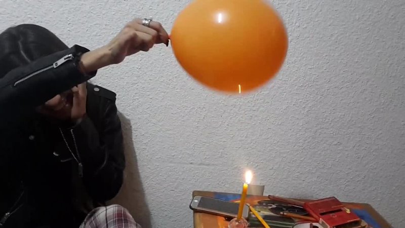 Balloon versus candle