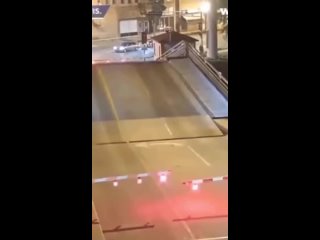 Idiots on bicycle - No pepsi, bridge operator saw what happened and stopped the bridge in place until the woman was rescued.