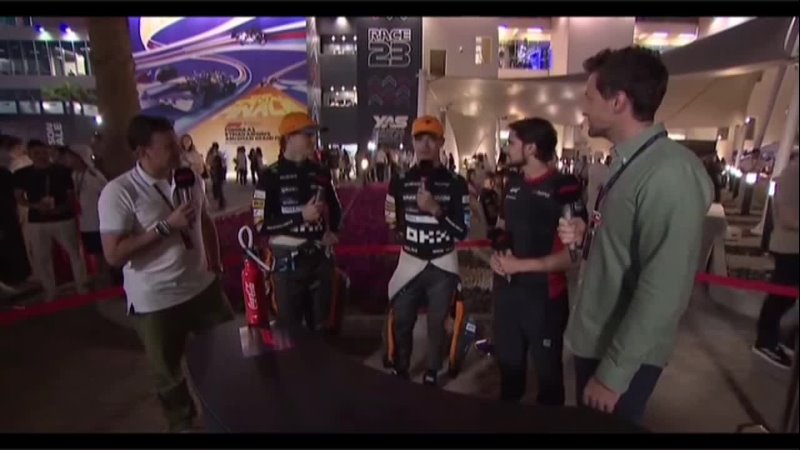 Lando with Yuki and Oscar after the race in Abu Dhabi 2023