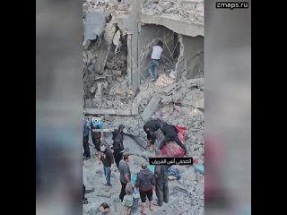 Разбор завалов на месте удара израильской авиации в Сектор Газа. Масштаб разрушений продолжает возра