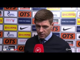 Kilmarnock players celebrate in background as Steven Gerrard reacts to Rangers loss at Rugby Park