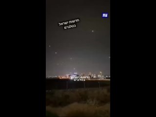 Airplane landing in Tel Aviv during the work of Iron Dome at night