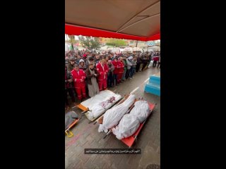 Funeral de cuatro trabajadores mdicos de la Media Luna Roja despus de que los ocupantes israeles bombardearan su ambulancia