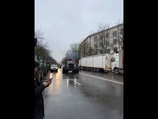 Soviet tractor T-150K in a column of tractors protesting farmers in one of the cities of Europe