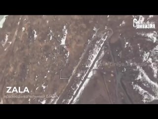 Russian Lancet drone hits camouflaged AFU tank
