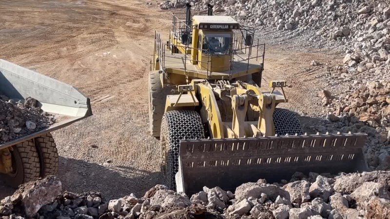 Huge Caterpillar 994  230 Tons Wheel Loader Loading Caterpillar 777F Dumpers - Samaras Mining Group