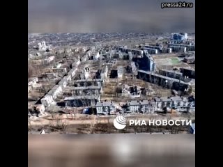 РИА Новости показывает уникальные кадры, снятые с беспилотника над освобожденной Авдеевкой, некогда