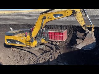 Caterpillar 365C Excavator Loading Trucks With Coal - Interkat SA