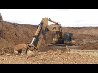 Caterpillar 365C L Excavator Loading Mercedes Actros 4144