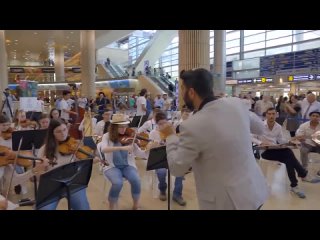 _ Hevenu Shalom Alehem _Jerusalem Academy flashmob for Taglit at Ben Gurion Airport (1).mp4