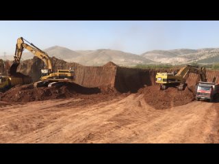 Four Caterpillar 365C Excavators Working On The Line