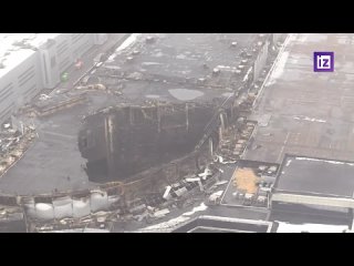 Кадры с вертолета выгоревшего после пожара здания Крокус Сити Холла
