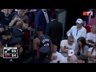 Bam Adebayo hobbles to the locker room after colliding with Hendricks at midcourt.