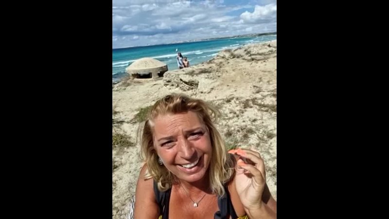 unknown MILF show her boobs on the beach