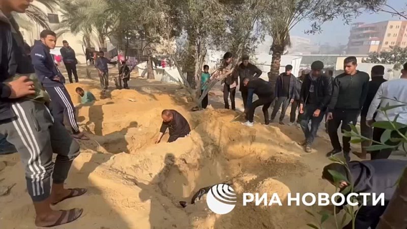 In Khan Younis in the southern Gaza Strip, killed Palestinians are being buried near the local